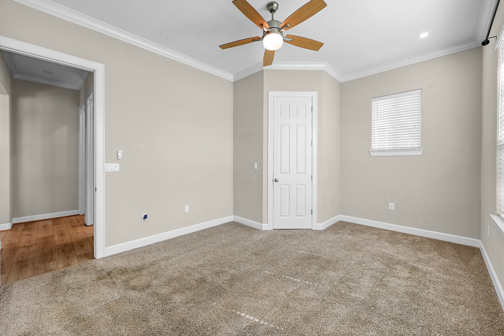 121 Bermuda Circle Montgomery, TX 77356 - Photo 34 of 44 an empty room with closet and a chandelier fan