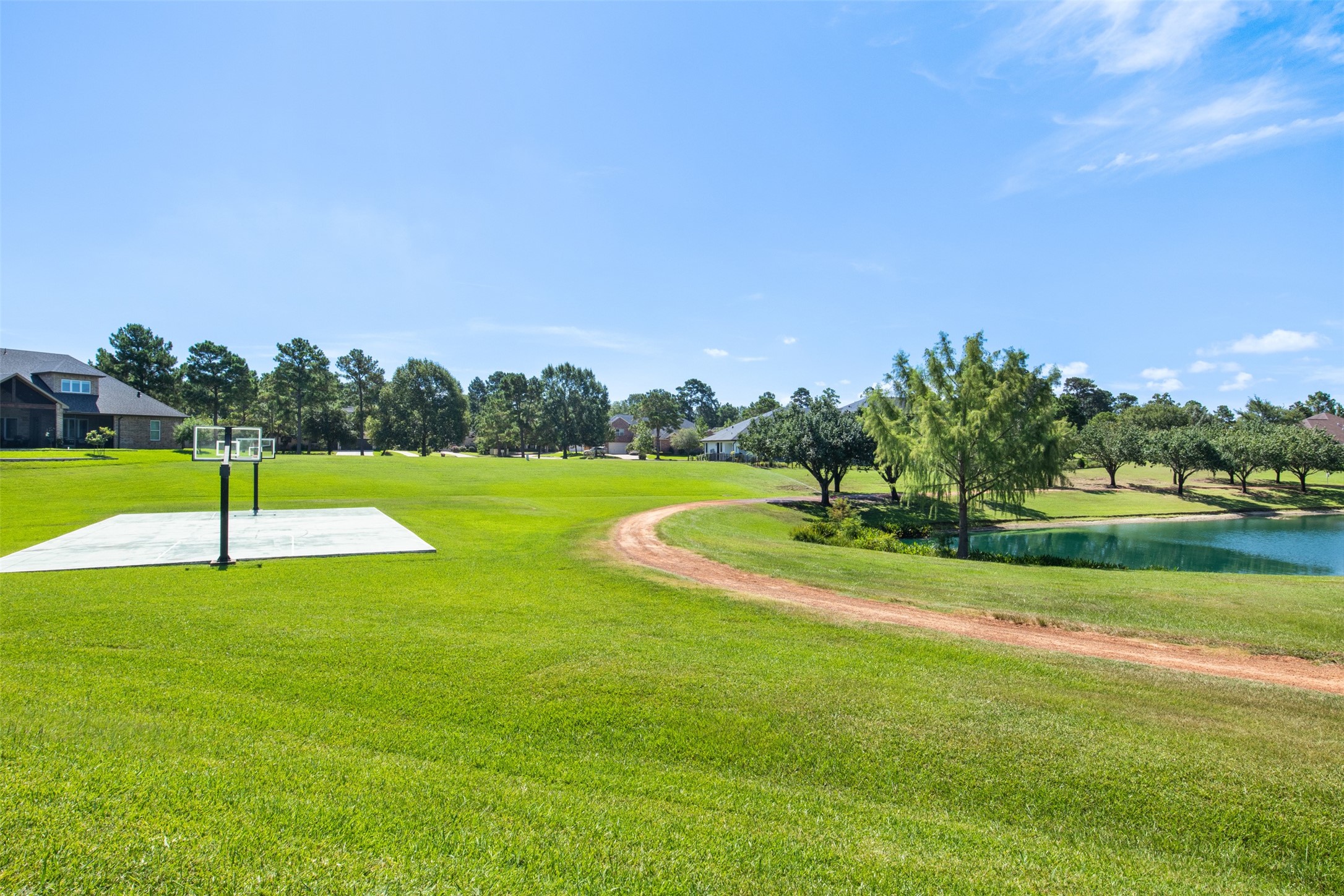 121 Bermuda Circle Montgomery, TX 77356 - Photo 42 of 44 a view of a golf course with a park