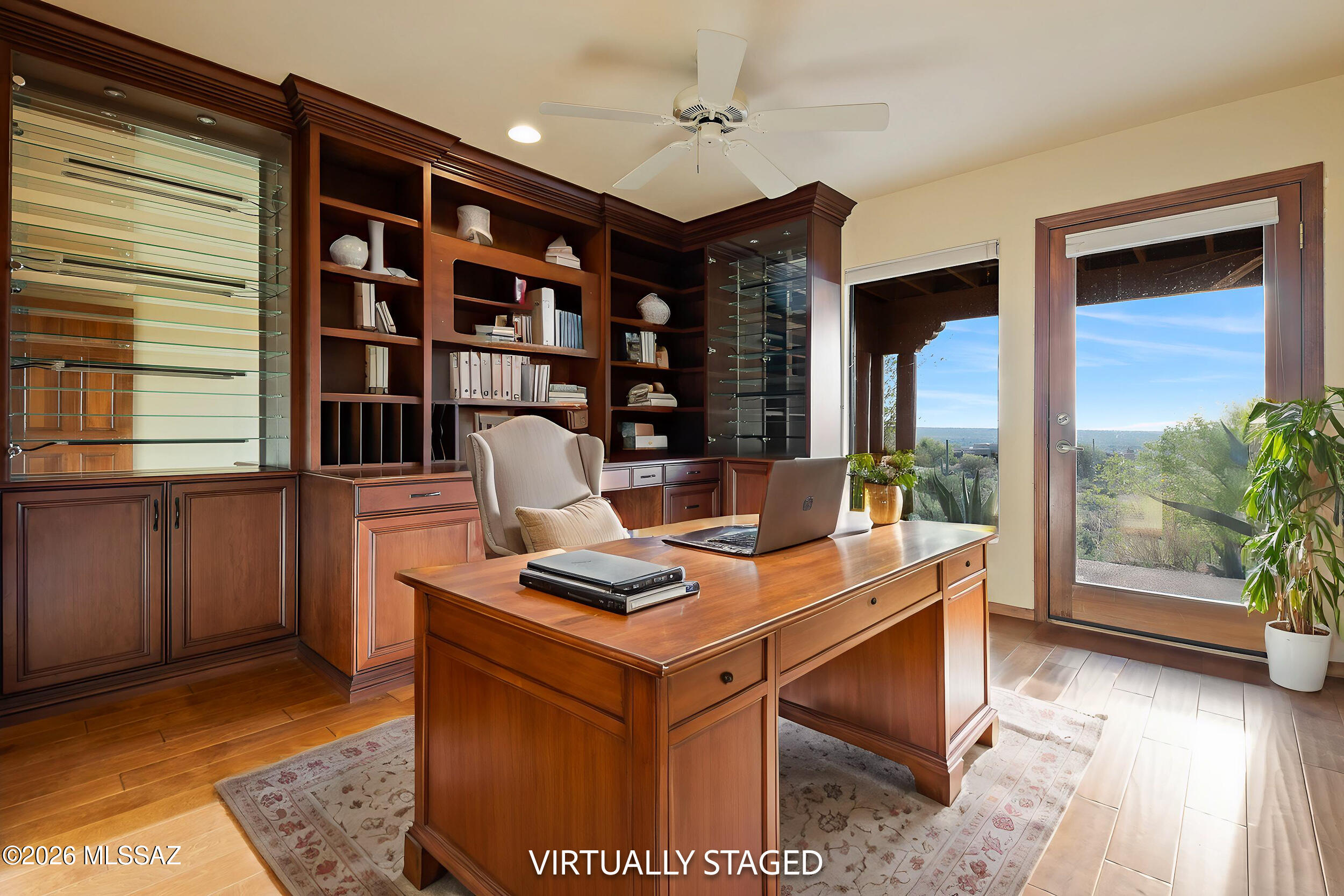 13630 East Sahuaro Sunset Road Tucson, AZ 85749 - Photo 8 of 47 a view of workspace with a bookshelf