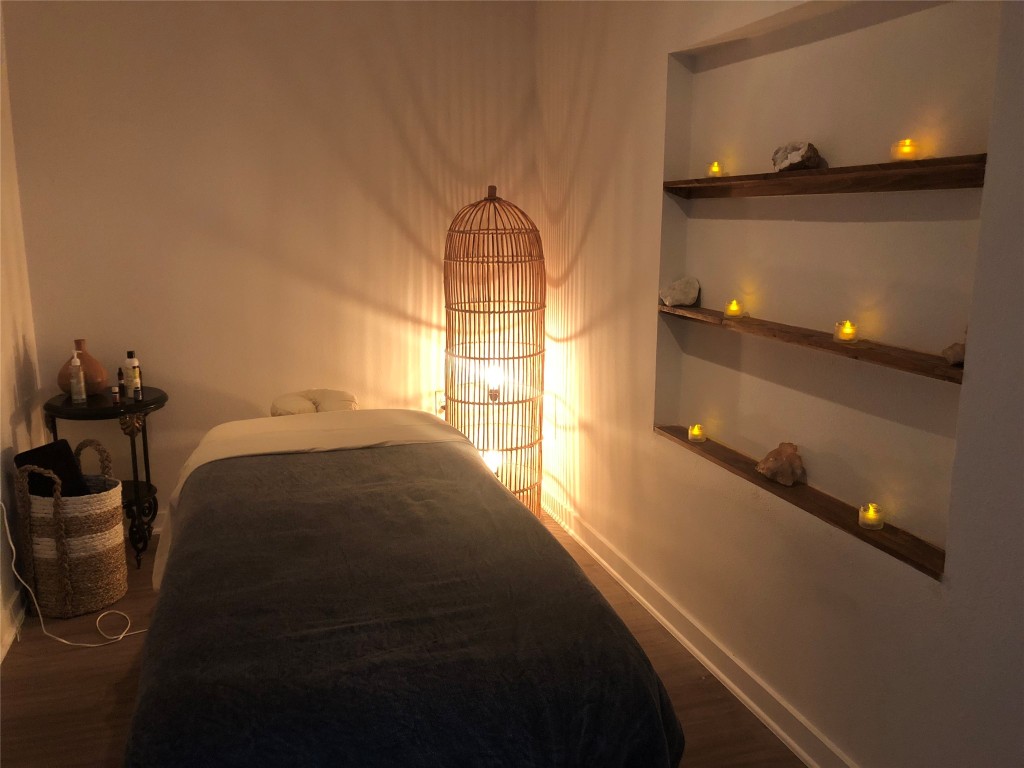 4361 South Congress Avenue, Unit 106 Austin, TX 78745 - Photo 5 of 11 a bedroom with a bed and window