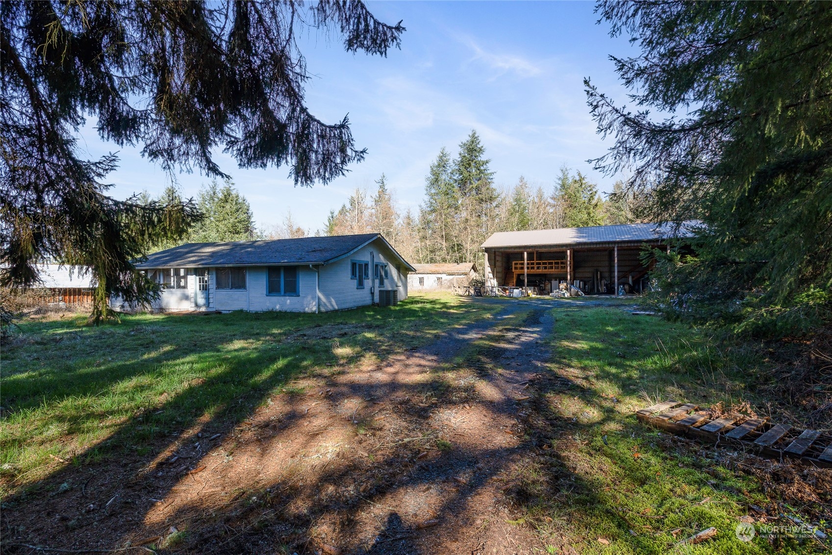 24710 Fisk Road East Orting, WA 98360 - Photo 12 of 25 a view of a house with a yard
