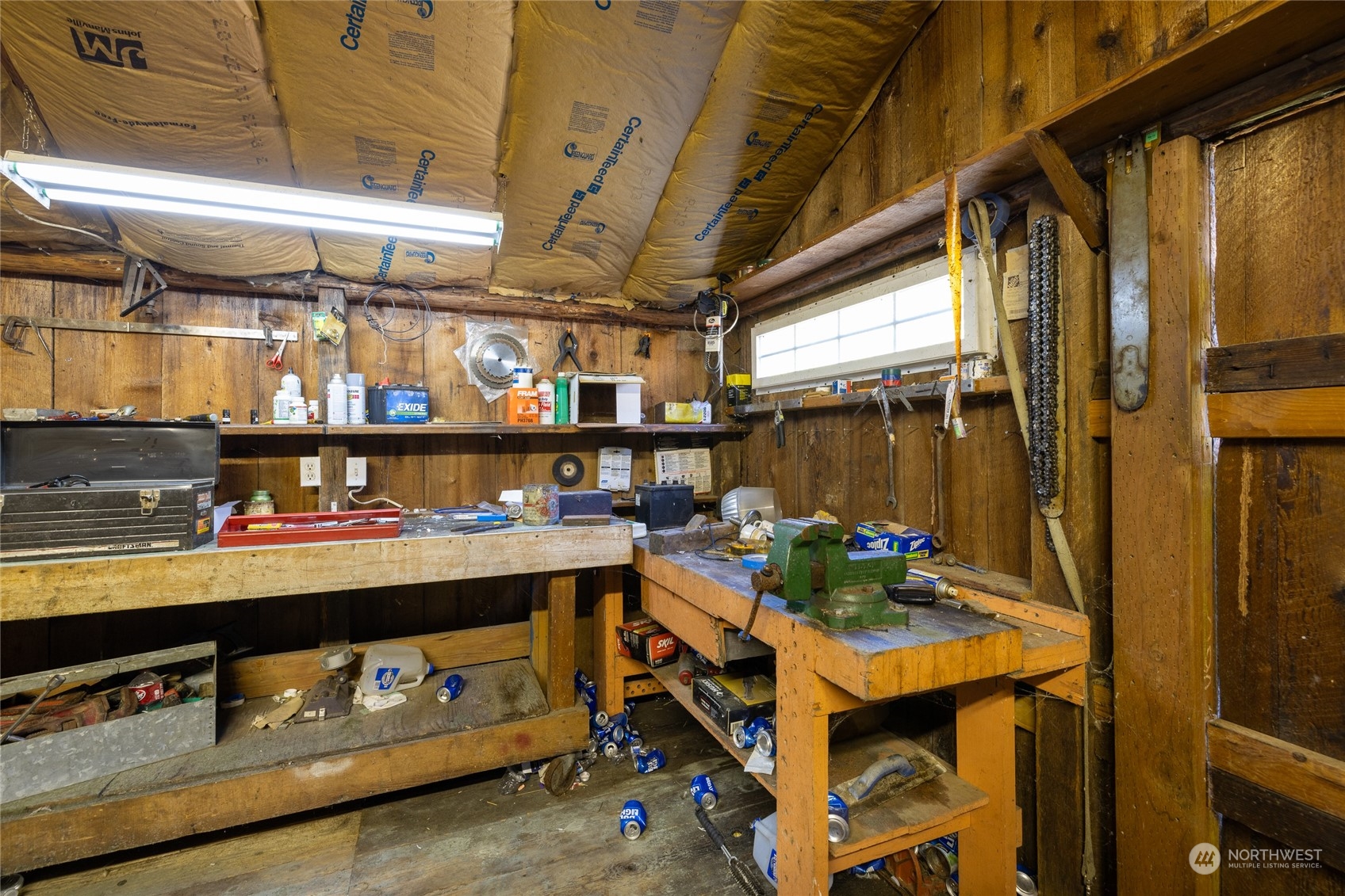 24710 Fisk Road East Orting, WA 98360 - Photo 24 of 25 a room with storage and a table