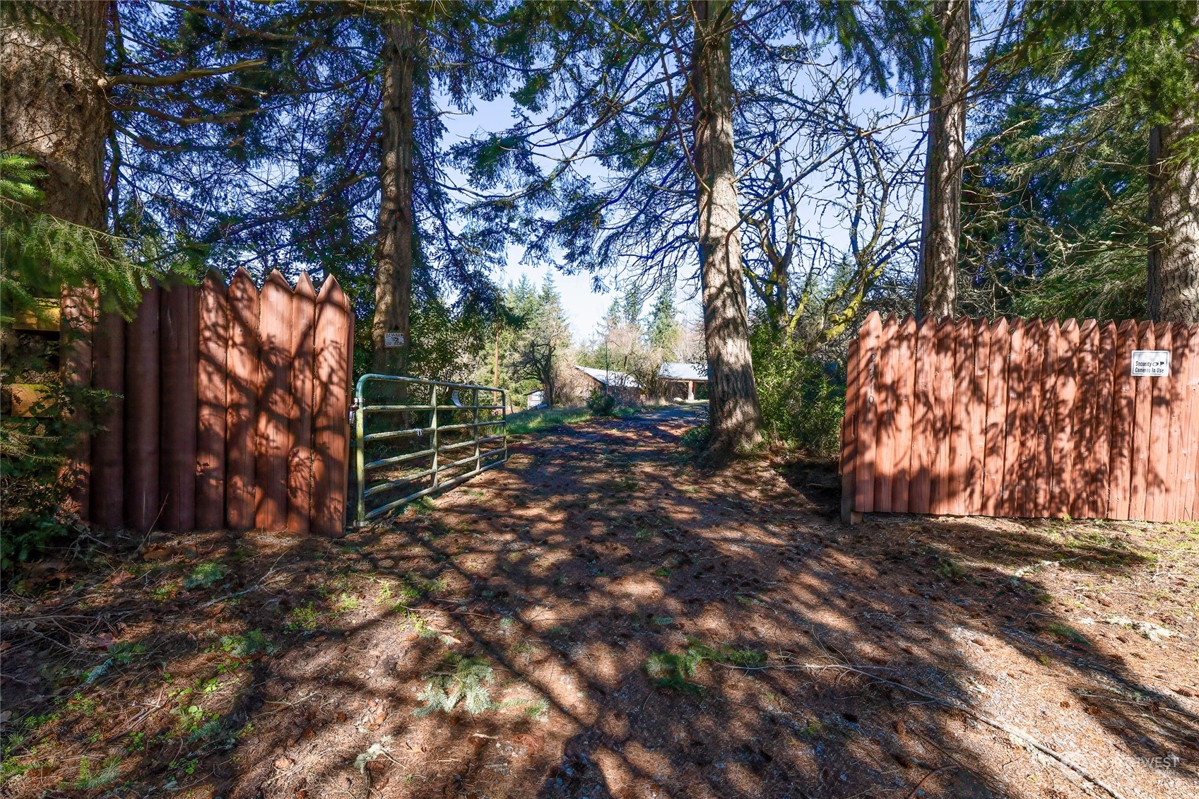 24710 Fisk Road East Orting, WA 98360 - Photo 3 of 25 a backyard of a house with lots of green space