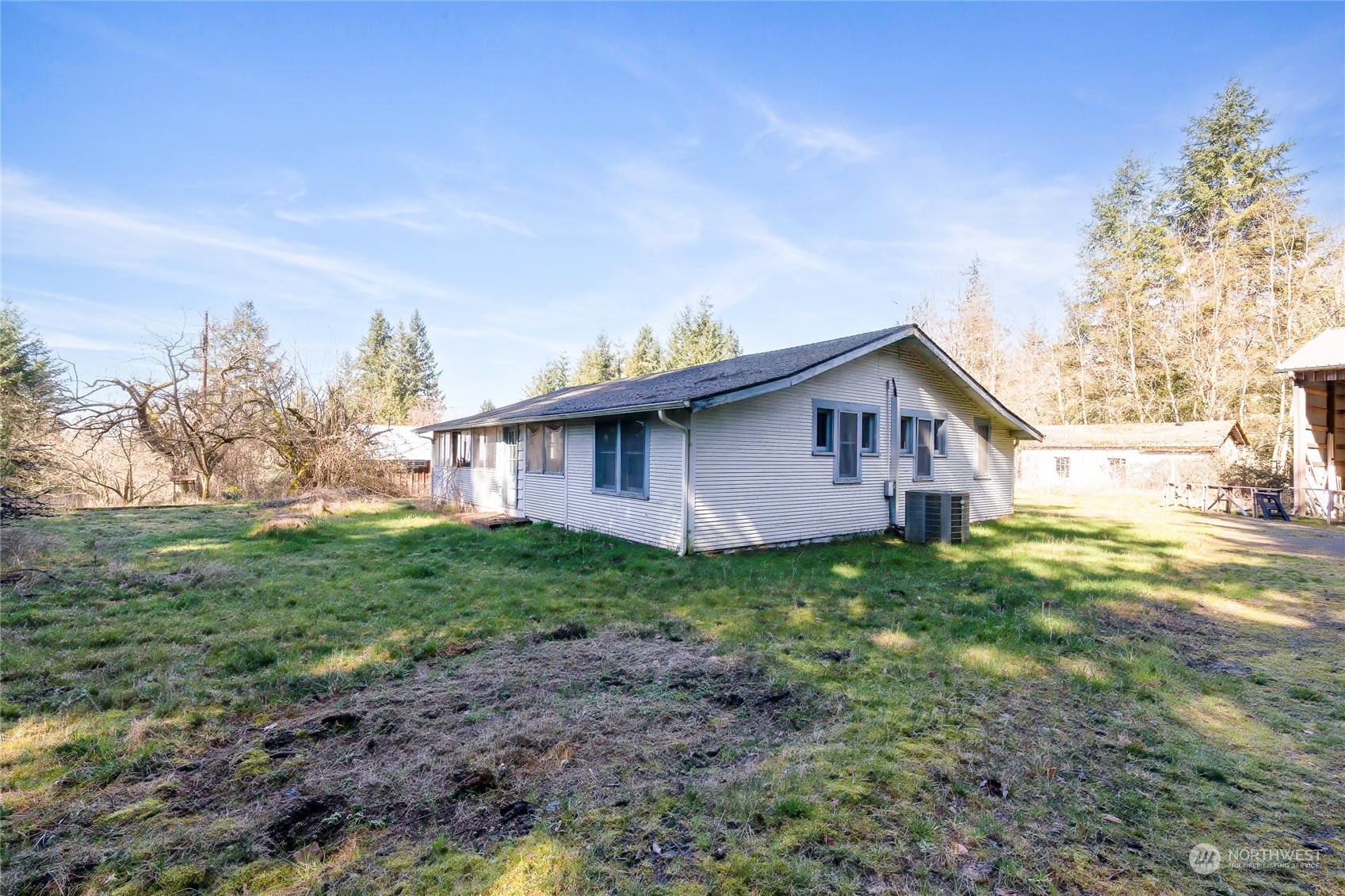 24710 Fisk Road East Orting, WA 98360 - Photo 4 of 25 a view of a house with a yard