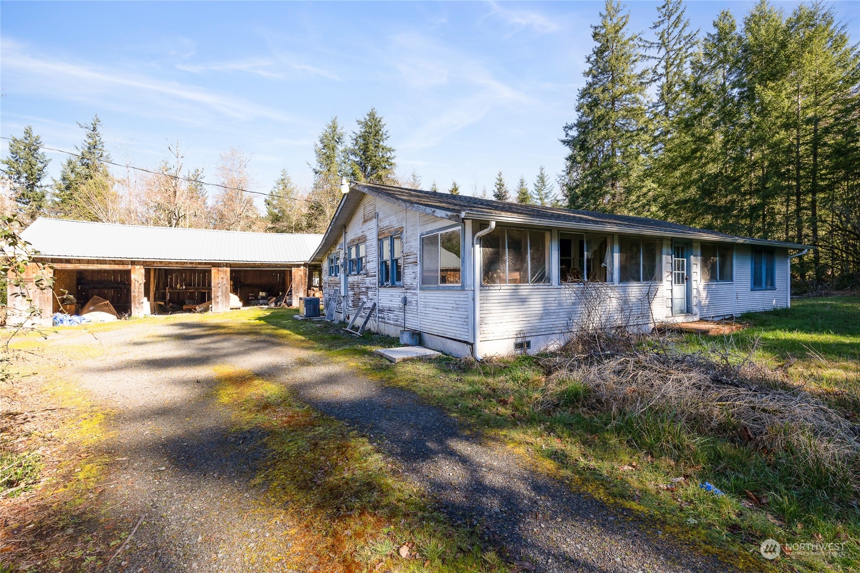 24710 Fisk Road East Orting, WA 98360 - Photo 5 of 25 a front view of a house with a yard