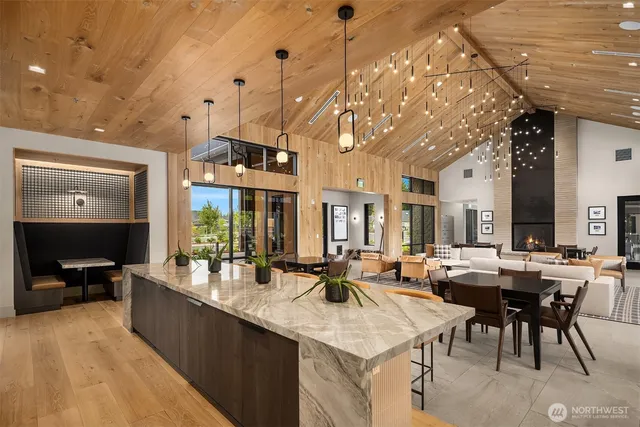 a large kitchen with lots of counter space and a sink