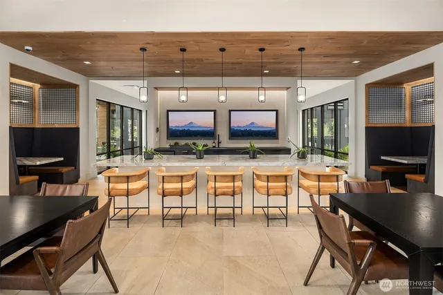 a dinning table and chairs in the kitchen
