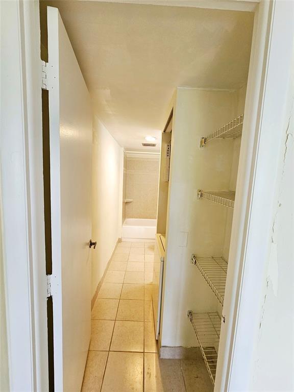 4172 Inverrary Drive, Unit 410 Lauderhill, FL 33319 - Photo 20 of 23 a bathroom with a granite countertop shower and a mirror