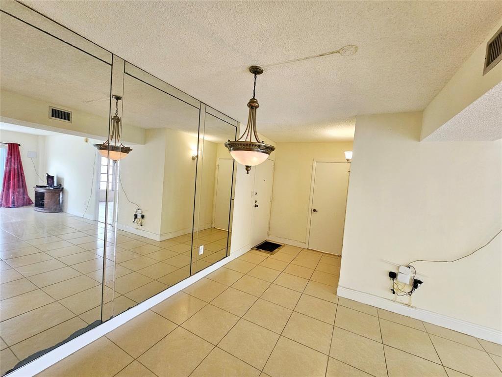 4172 Inverrary Drive, Unit 410 Lauderhill, FL 33319 - Photo 4 of 23 a bathroom with a shower