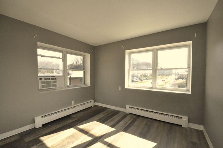 506 Main Street Marseilles, IL 61341 - Photo 8 of 8 a view of a room with wooden floor and a window