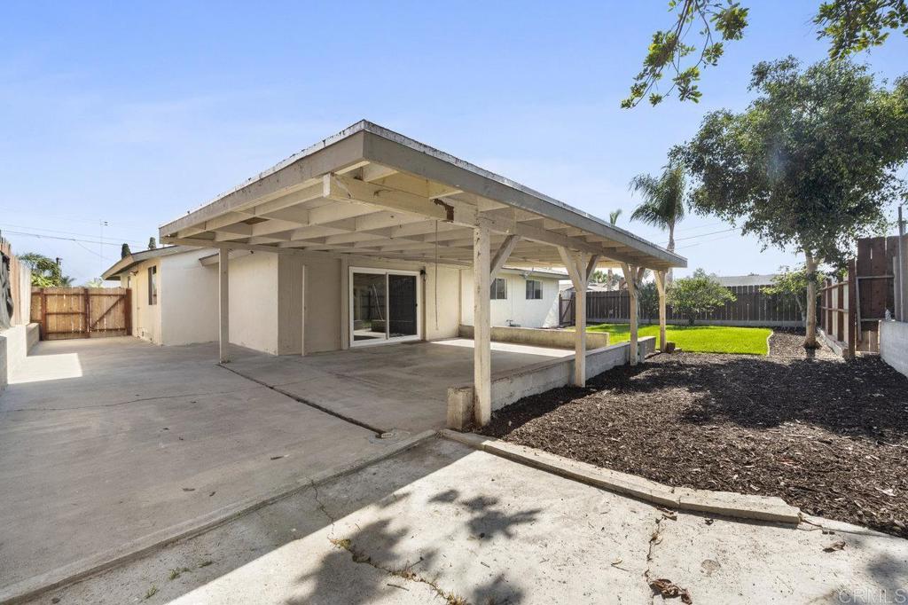 3129 Glenn Road Oceanside, CA 92056 - Photo 25 of 31 a view of a house with backyard and swimming pool
