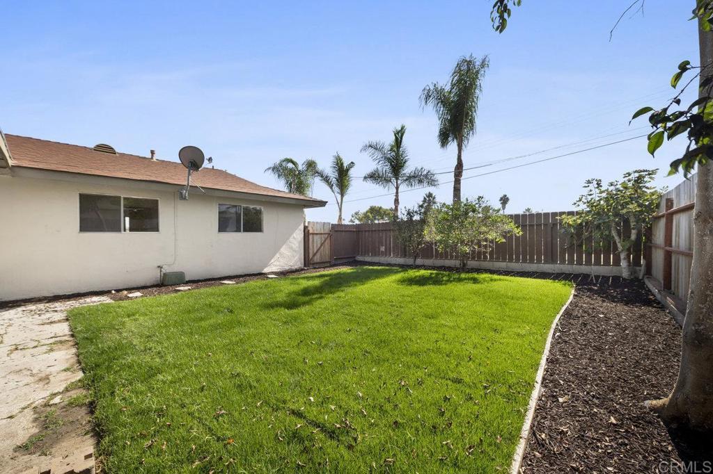 3129 Glenn Road Oceanside, CA 92056 - Photo 29 of 31 a view of a house with backyard and garden