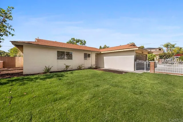 a view of a backyard with a garden
