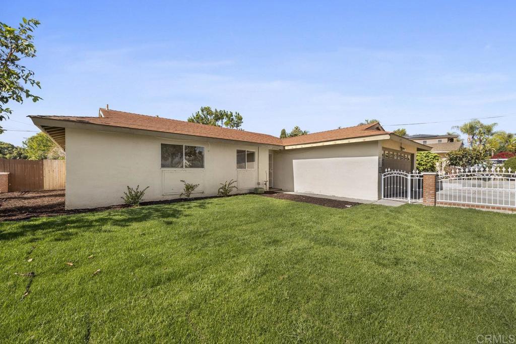 3129 Glenn Road Oceanside, CA 92056 - Photo 4 of 31 a view of a backyard with a garden