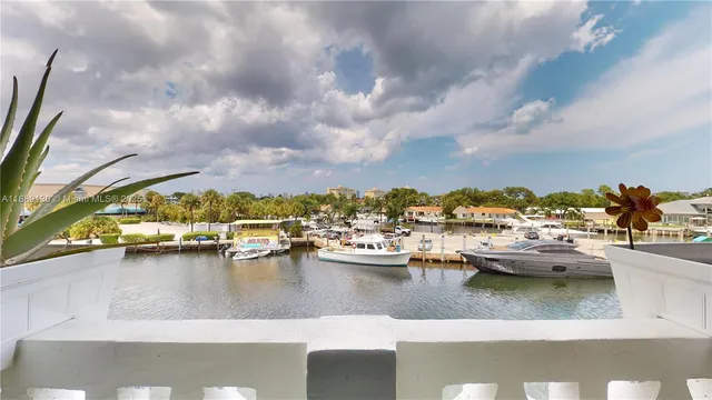 a view of swimming pool with outdoor seating