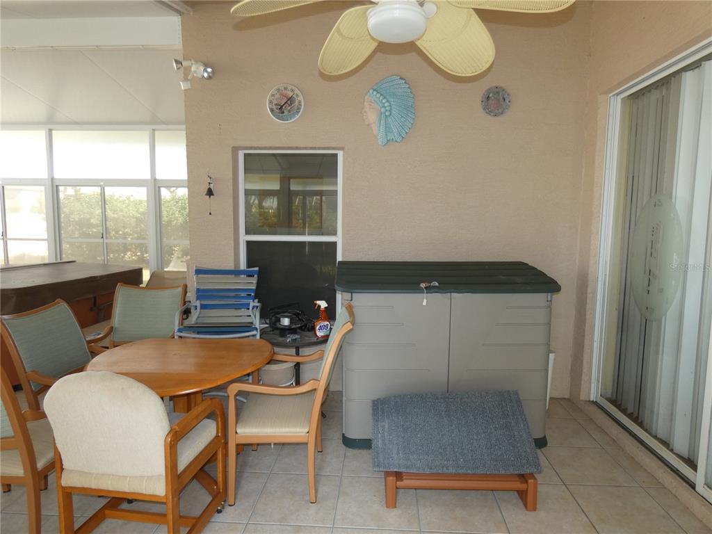 13541 Knotty Lane Hudson, FL 34669 - Photo 27 of 32 a dining room with furniture and window