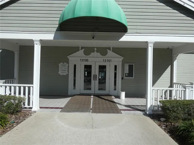 a front view of a house with garage