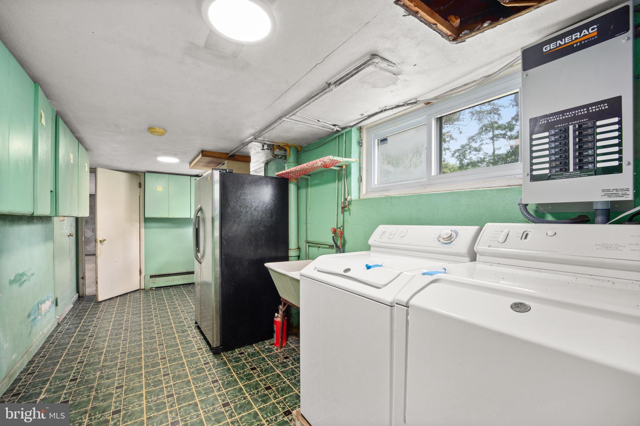 417 Gribbel Road Wyncote, PA 19095 - Photo 34 of 44 a utility room with dryer and washer