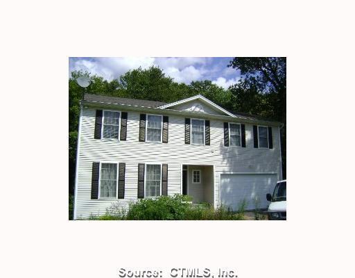 150 Town Line Road Bristol, CT 06010 - Photo 1 of 1 a front view of a house with a yard