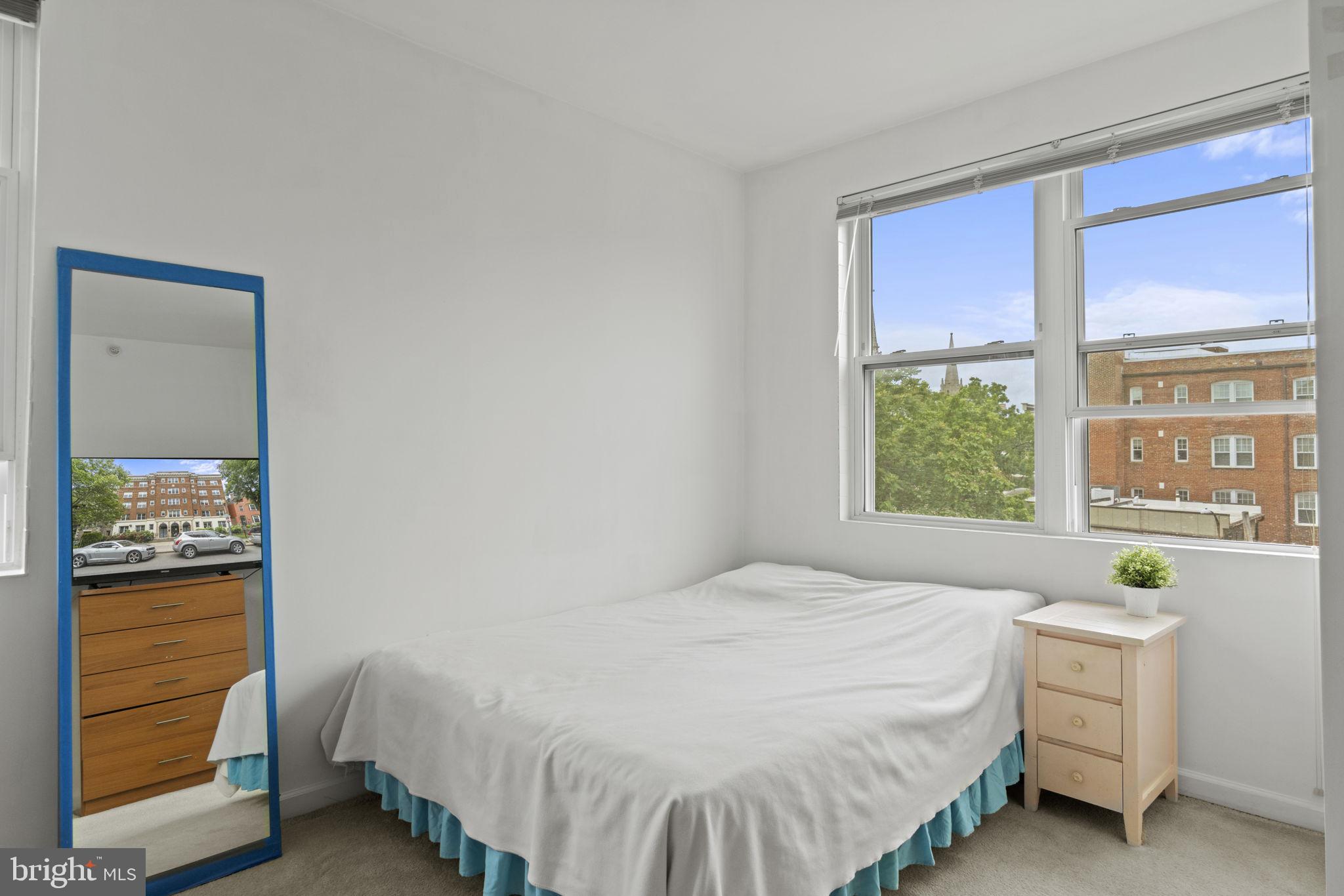 1458 Columbia Road Northwest, Unit 410 Washington, DC 20009 - Photo 10 of 18 Corner bedroom has 3 sunny windows
