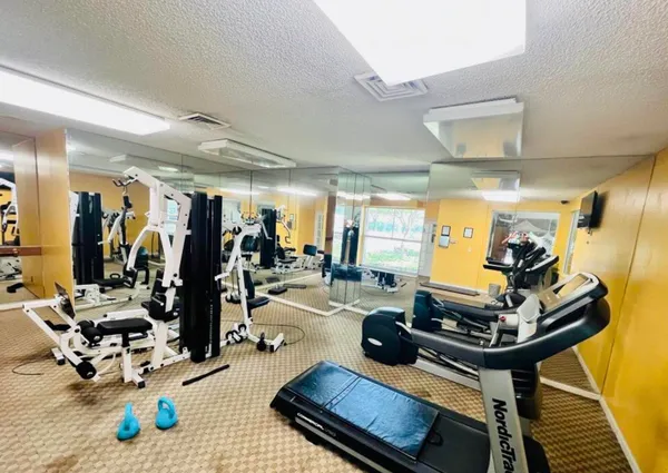a view of a room with gym equipment