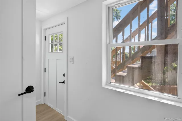 a view of entryway with a front door