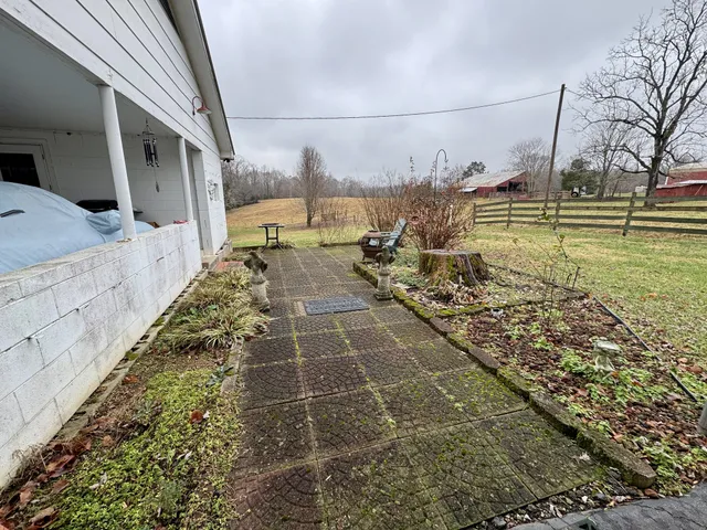 a house view with a garden space