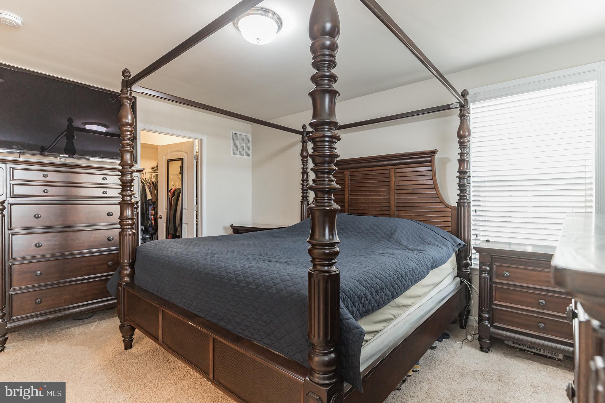 9520 Smithview Place Glenarden, MD 20706 - Photo 19 of 33 canopy bed in primary bedroom