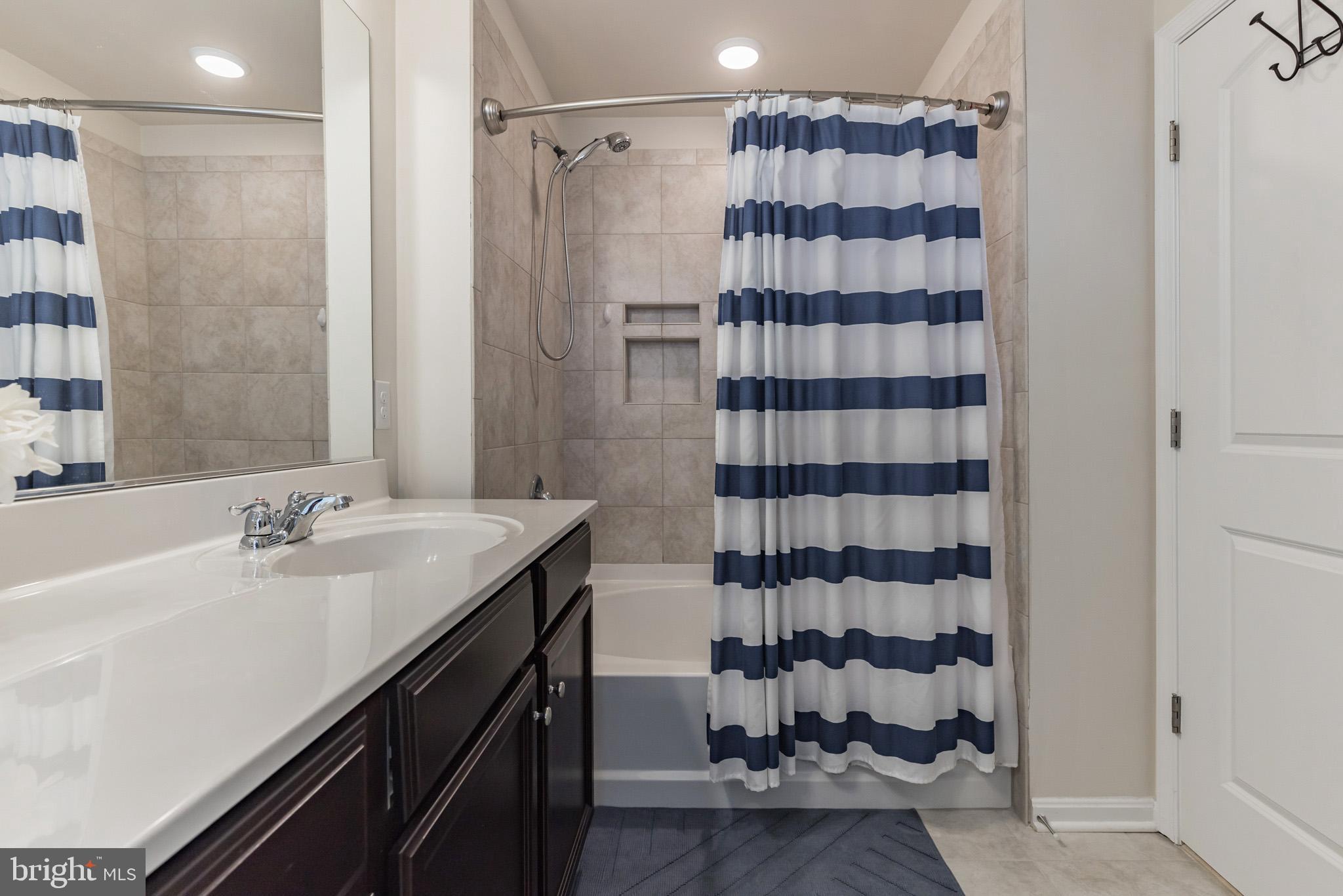 9520 Smithview Place Glenarden, MD 20706 - Photo 24 of 33 soaking tub and shower combination in primary bath