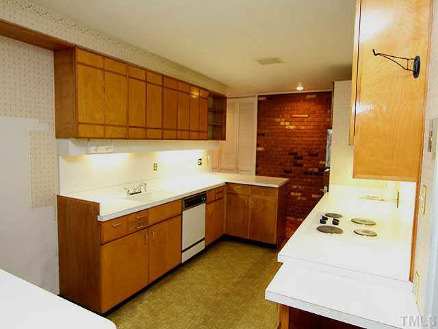 3205 Caldwell Drive Raleigh, NC 27607 - Photo 4 of 14 Galley kitchen with ample cabinets and storage Kitchen