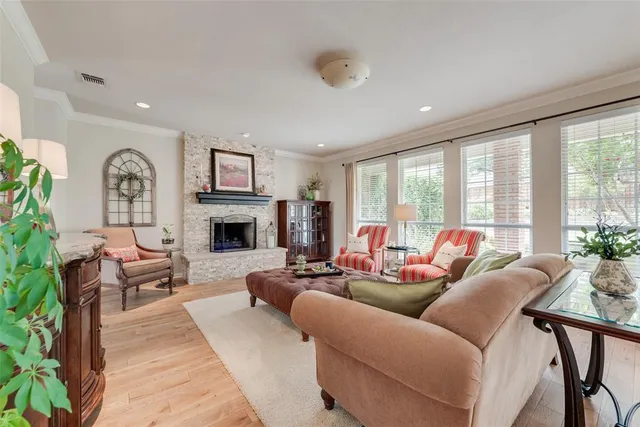 a kitchen with stainless steel appliances kitchen island granite countertop a sink and cabinets