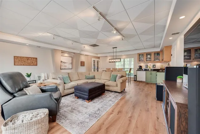 a bathroom with a toilet a sink and a mirror