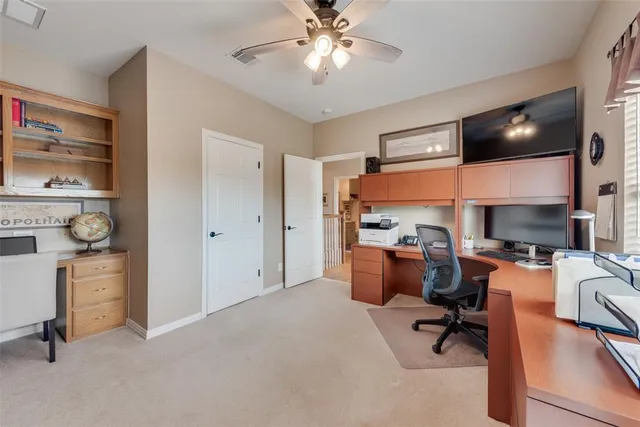 a view of a patio with table and chairs and potted plants