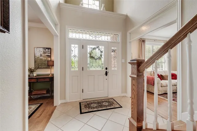 a view of a dining room with furniture and window