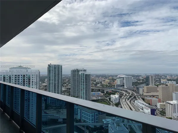 a view of a city skyline from a balcony