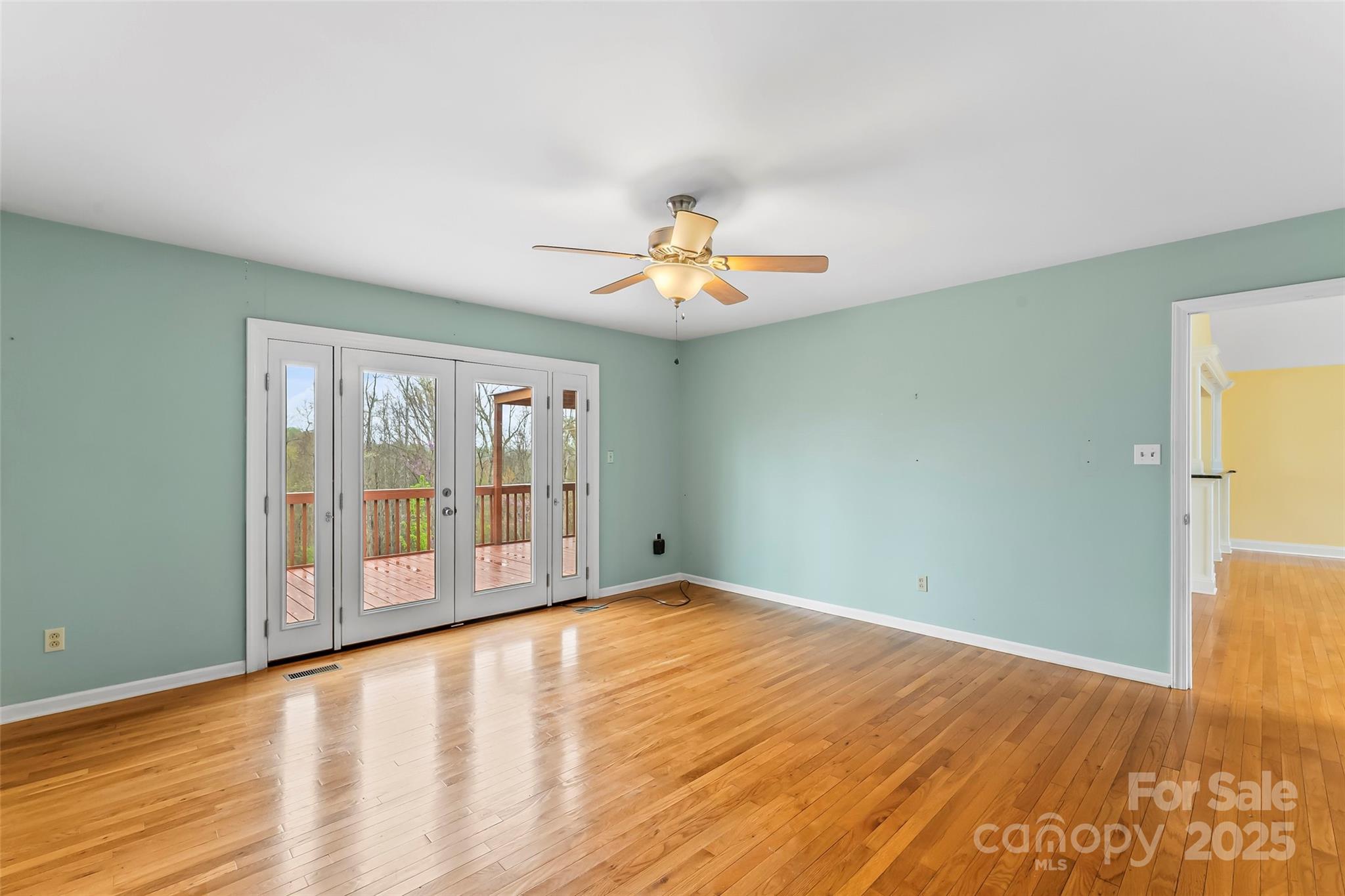 3772 Sandy Ford Road Hickory, NC 28602 - Photo 11 of 32 wooden floor in an empty room with a window