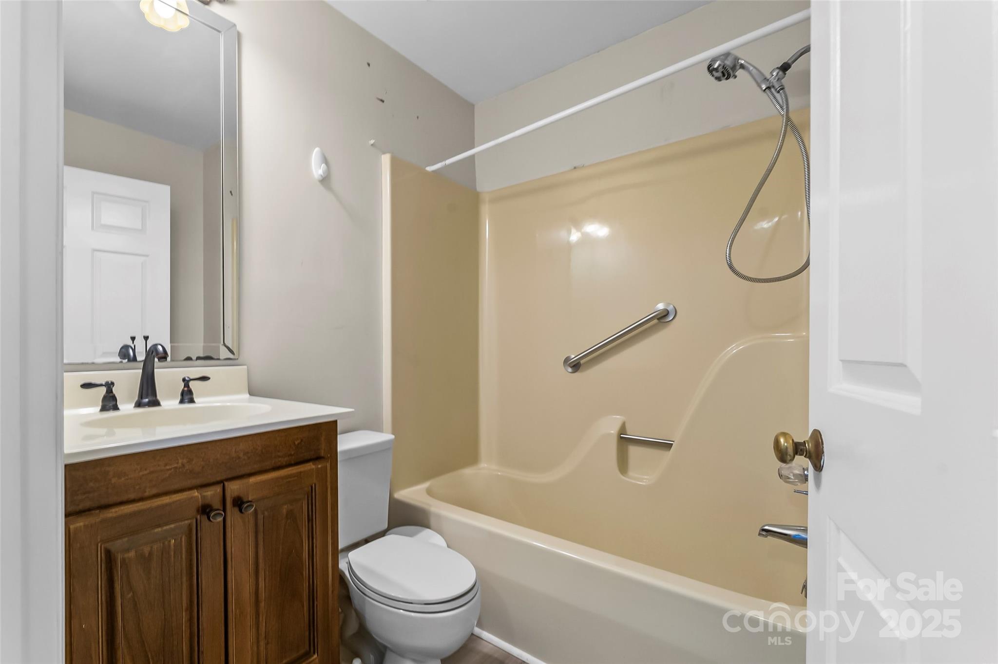 3772 Sandy Ford Road Hickory, NC 28602 - Photo 17 of 32 a bathroom with a granite countertop sink toilet and shower