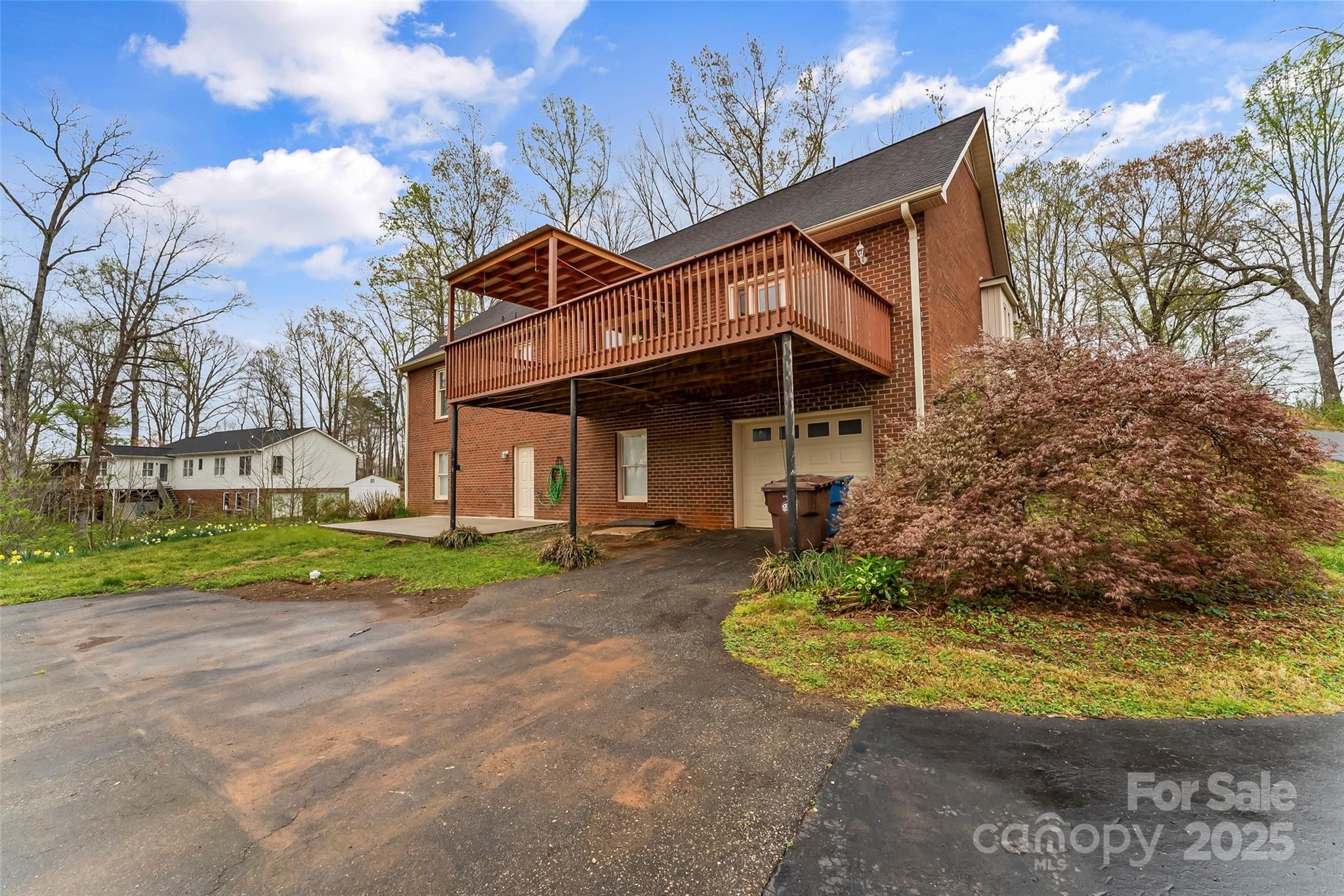 3772 Sandy Ford Road Hickory, NC 28602 - Photo 26 of 32 a view of a house with a yard and large tree