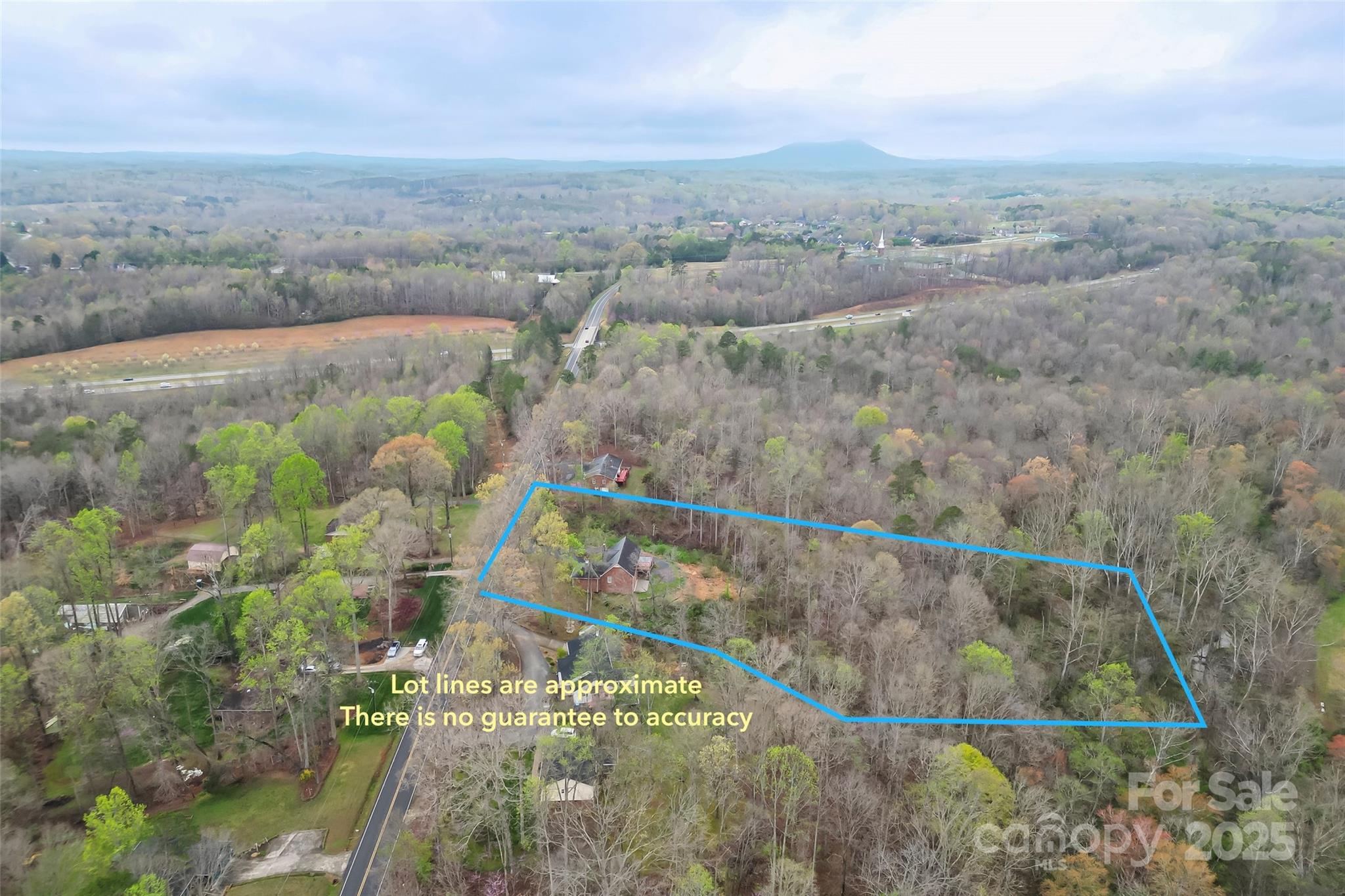 3772 Sandy Ford Road Hickory, NC 28602 - Photo 29 of 32 an aerial view of house with yard and mountain view in back