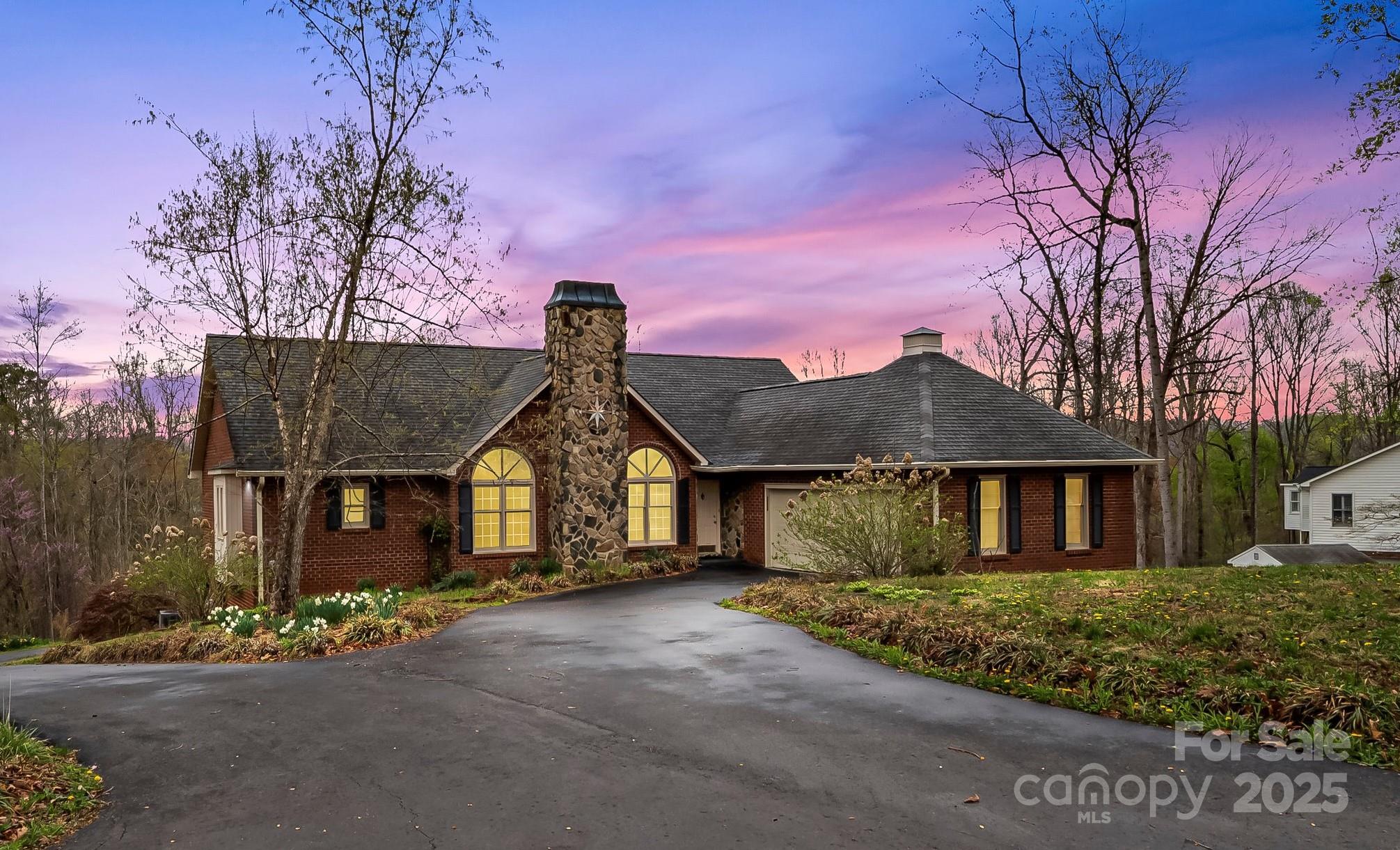 3772 Sandy Ford Road Hickory, NC 28602 - Photo 32 of 32 a front view of a house with a garden