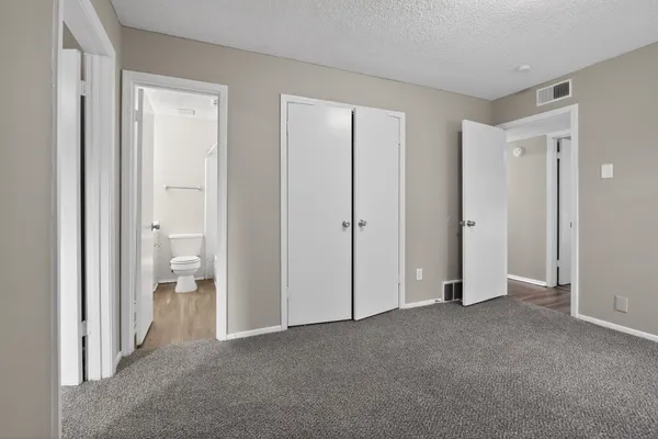 a view of room with a hallway