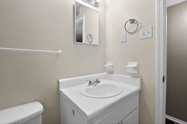 a bathroom with a sink and a toilet