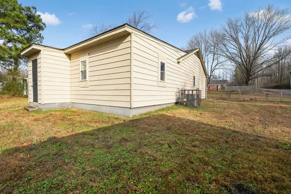 a view of a backyard with a garden