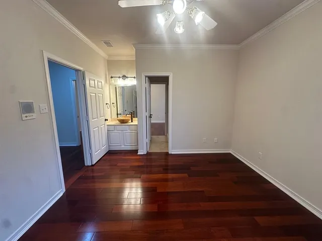a view of a livingroom with wooden floor
