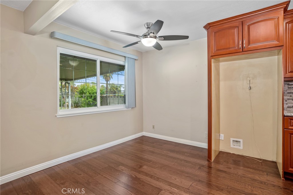 1734 North Vallejo Way Upland, CA 91784 - Photo 13 of 43 an empty room with wooden floor fan and windows