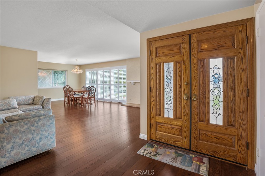 1734 North Vallejo Way Upland, CA 91784 - Photo 20 of 43 a living room with furniture and wooden floor