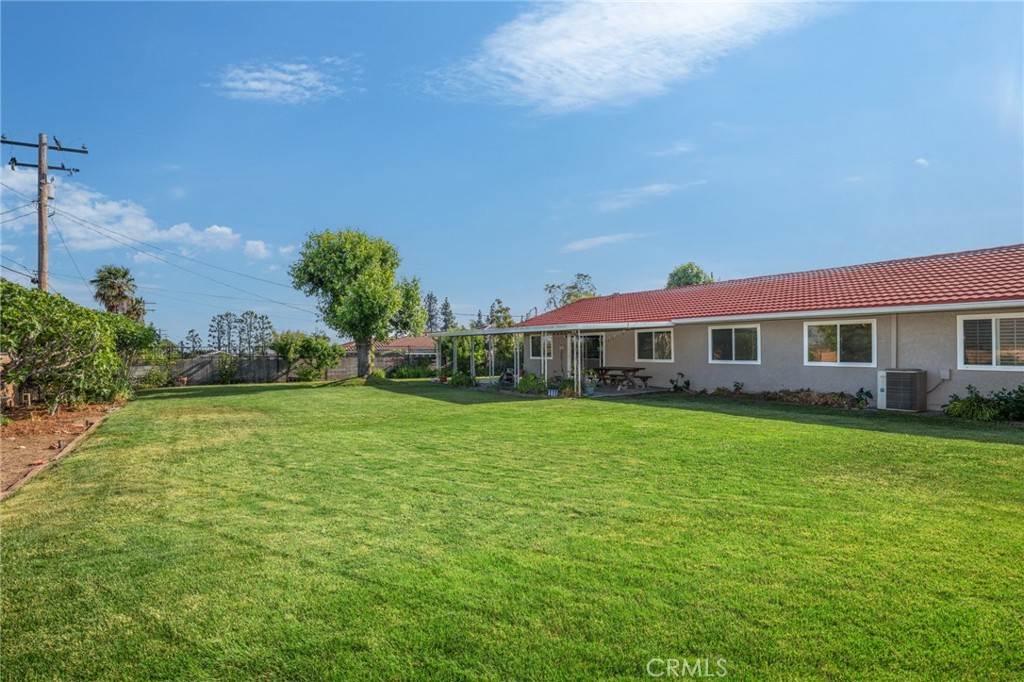 1734 North Vallejo Way Upland, CA 91784 - Photo 42 of 43 a front view of a house with a garden