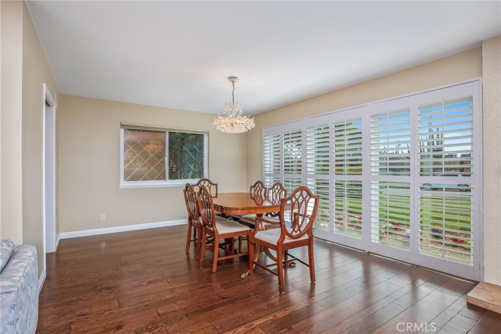 1734 North Vallejo Way Upland, CA 91784 - Photo 7 of 43 a view of a dining room with furniture window and wooden floor