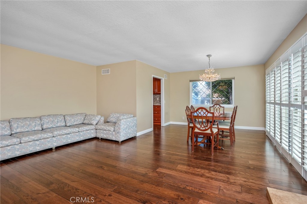 1734 North Vallejo Way Upland, CA 91784 - Photo 8 of 43 a living room with furniture and a wooden floor