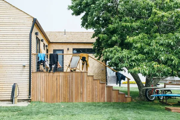 a view of a house with a backyard